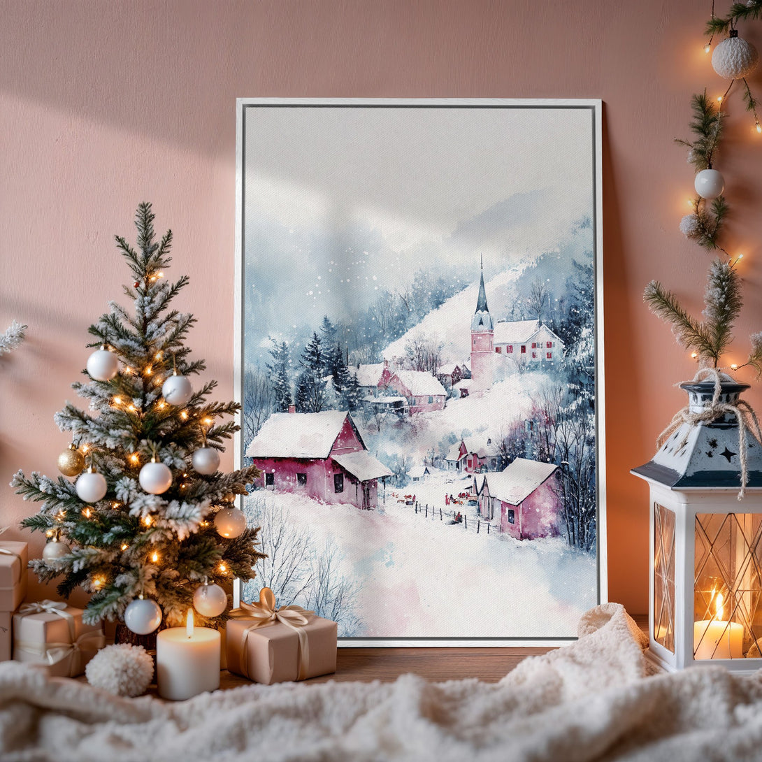 Framed Wall Art: Watercolor winter village scene in blue, pink, and white. Perfect for cozy holiday decor. Shop our Canvas Print collection today!