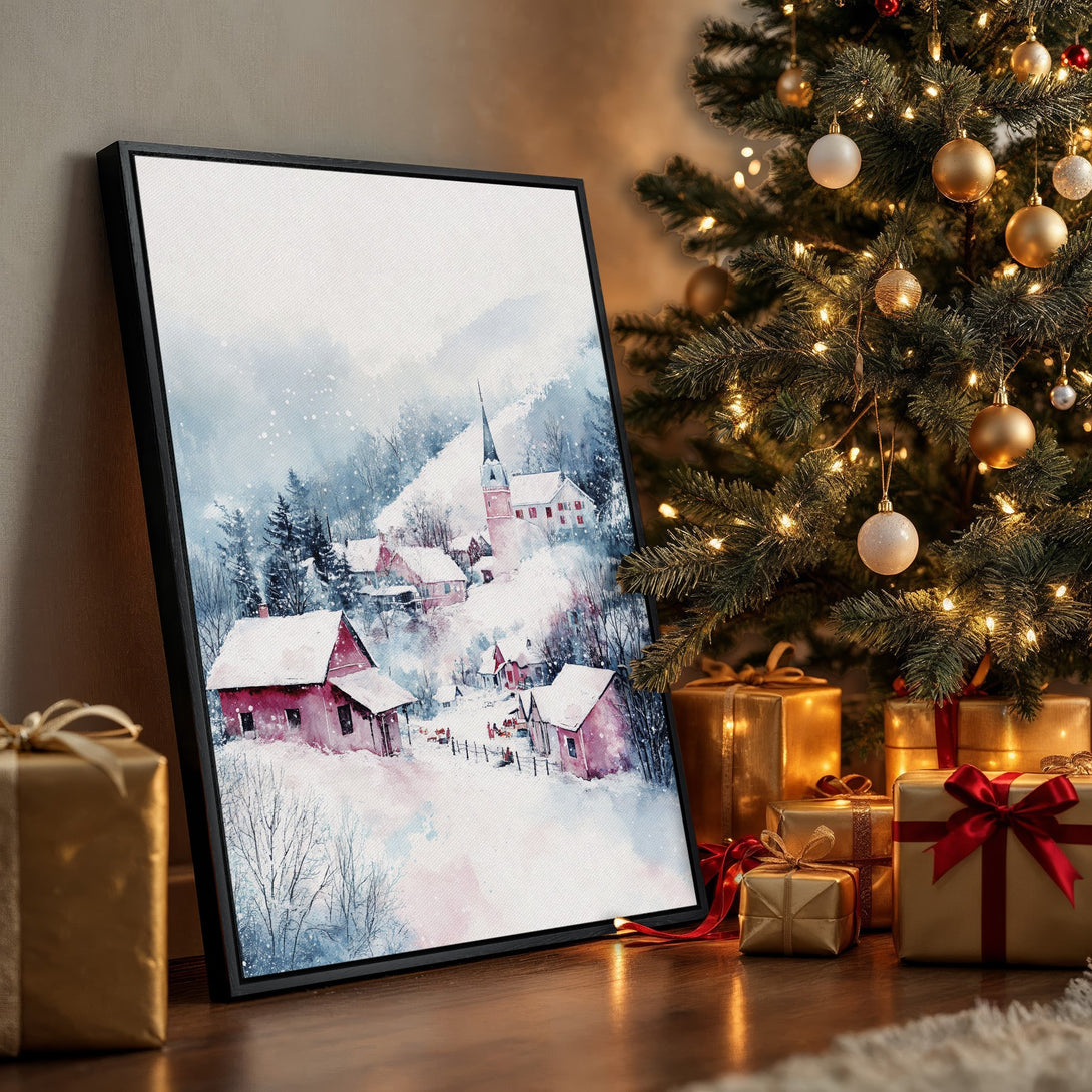 Framed Wall Art of a snowy village scene in watercolor style. Features a red and blue color palette, perfect for adding a cozy touch to your home.