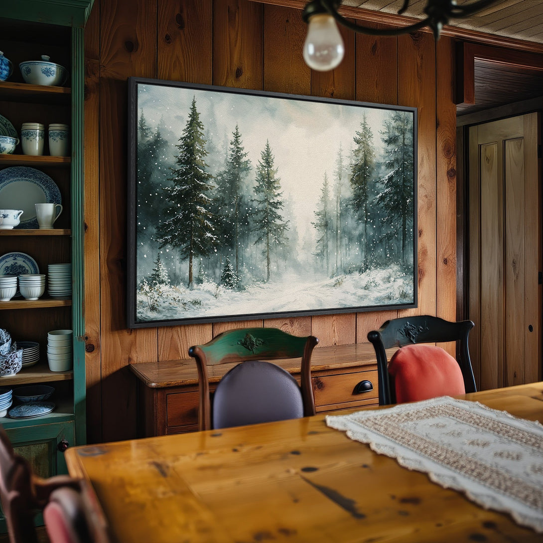 Framed Wall Art: Winter forest scene with snowy trees in muted blues and greens. Perfect for cozy cabin decor.