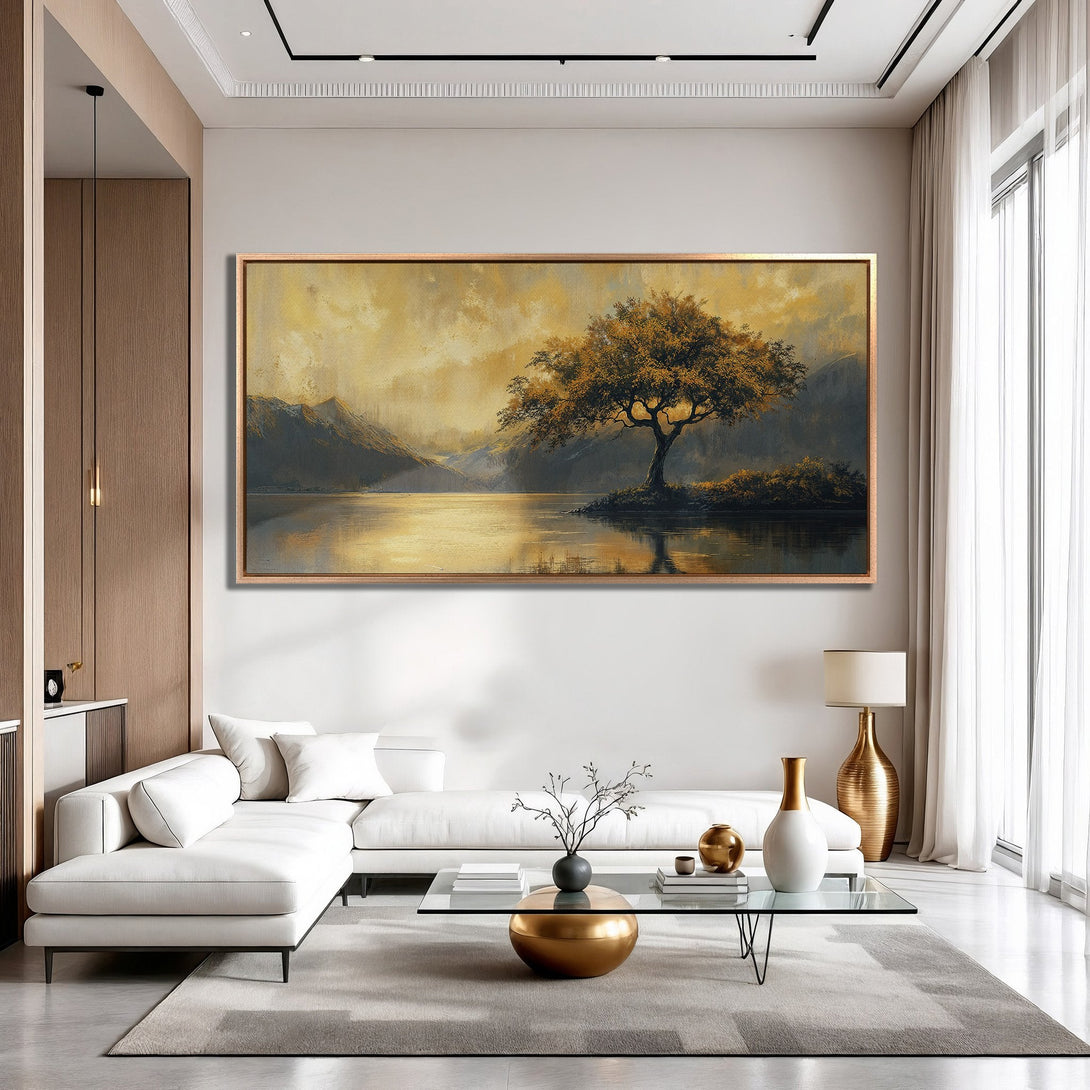 Framed Wall Art: Landscape painting of a tree by a lake, warm gold and gray color palette, perfect for living room decor.