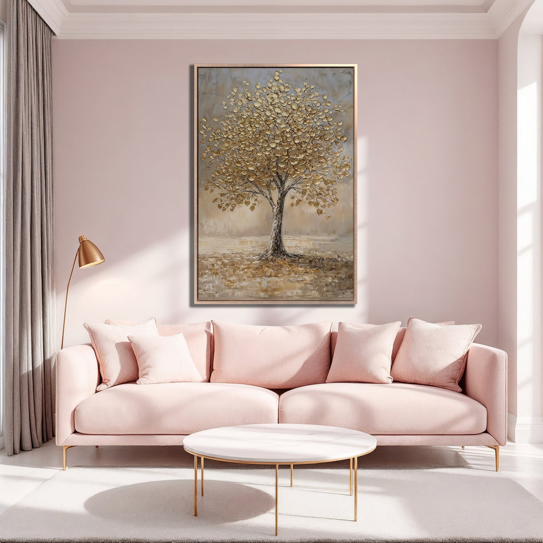 Framed Wall Art: Gold leaf tree painting in a blush pink living room. Modern, elegant decor with a warm, inviting color palette.