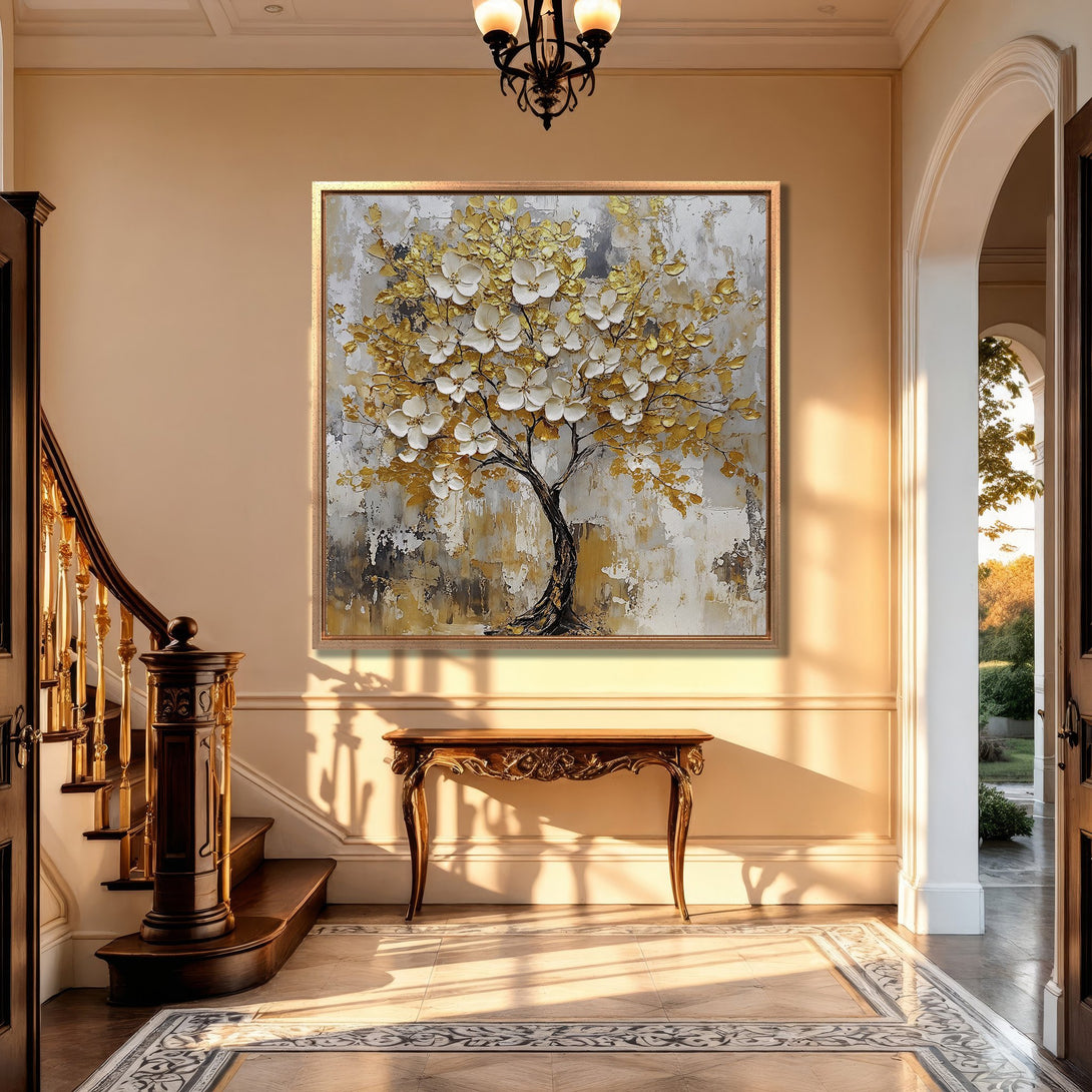 Framed Wall Art: Abstract tree art in gold and white, displayed in a luxurious interior. Adds elegance and warmth to any space. Shop now!