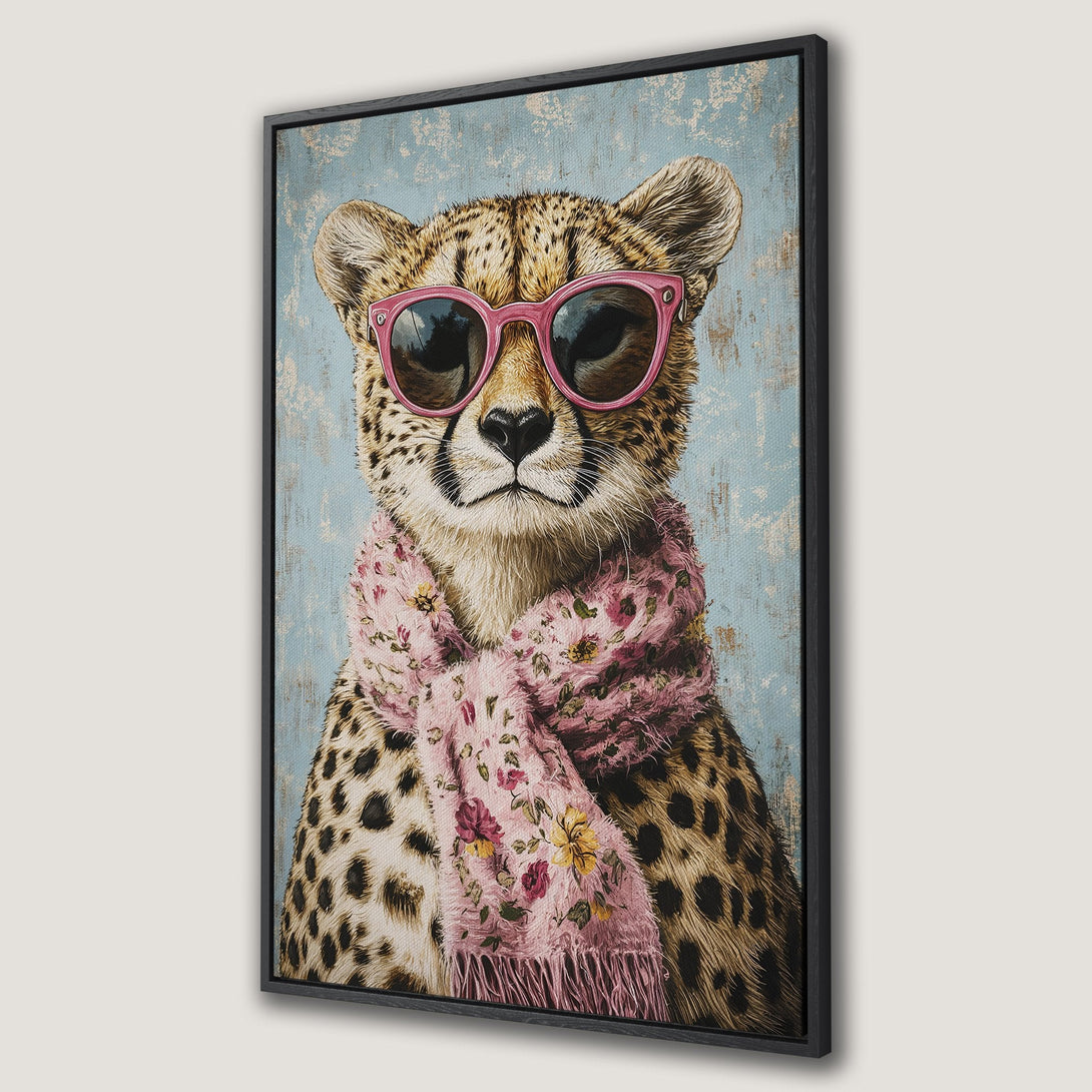 Framed Wall Art featuring a stylish cheetah wearing pink sunglasses and scarf. Whimsical animal portrait with a blue and pink color palette. Perfect wall decor!
