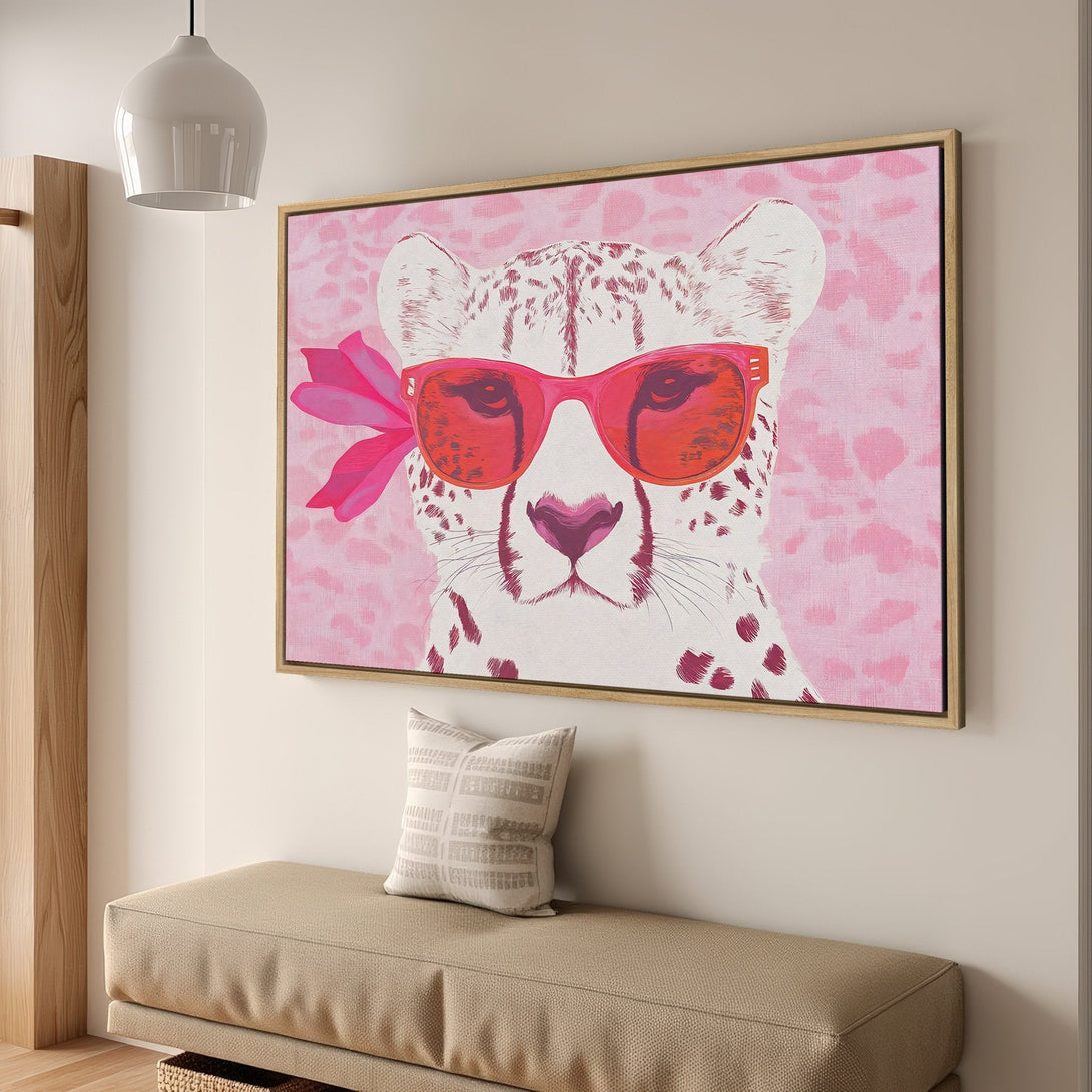 Canvas Print of a stylish cheetah wearing sunglasses, pop art style, with a pink and white color palette, perfect for adding a touch of fun to your home.
