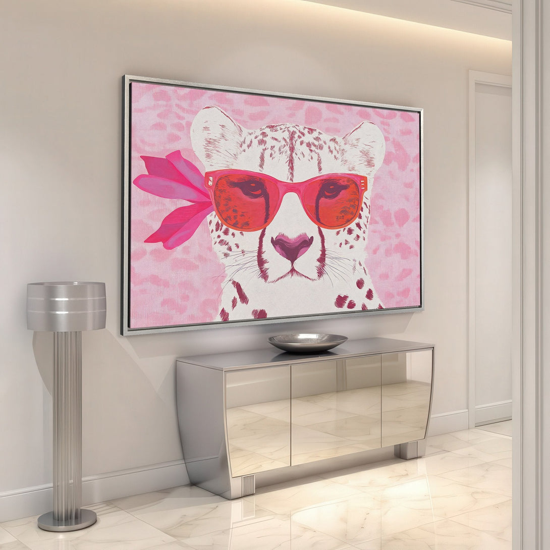 Framed Wall Art: Playful cheetah print canvas with pink and red hues. Modern art for a stylish home.