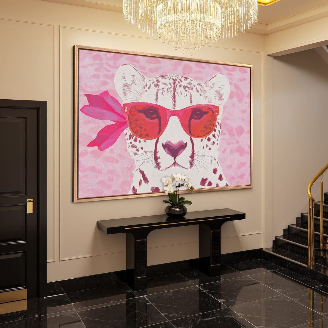Framed Wall Art: Playful cheetah portrait in pink and red hues. Adds a touch of fun and sophistication to any space. Shop now!