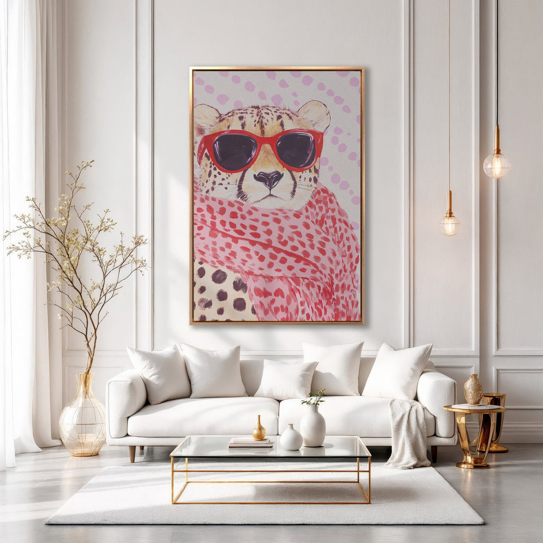 Framed Wall Art: Stylish cheetah print in red and pink, adding a pop of color to a modern living room. Perfect for animal lovers!