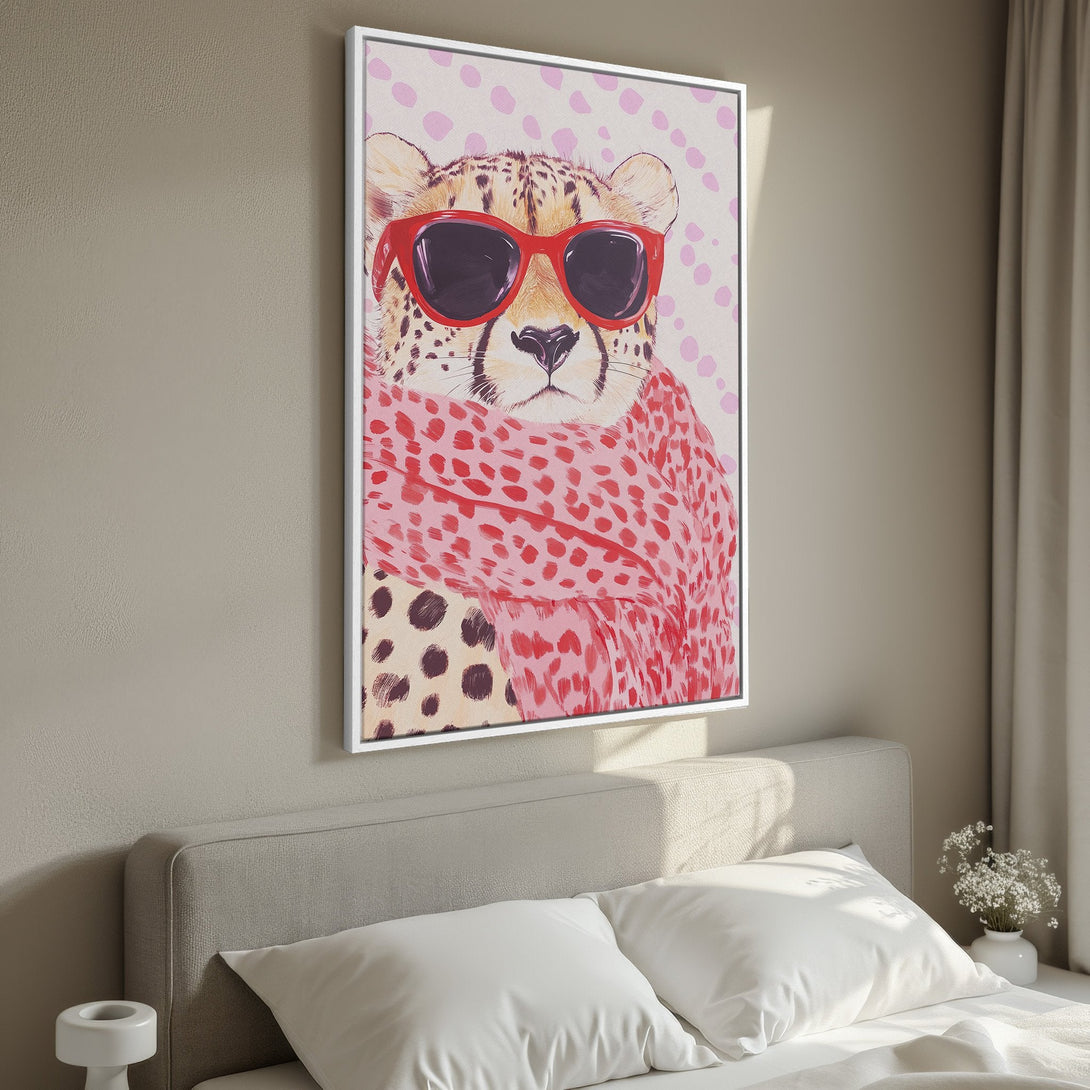 Framed Wall Art featuring a stylish cheetah wearing sunglasses and a pink scarf. Modern art with a pop of color, perfect for bedroom decor.
