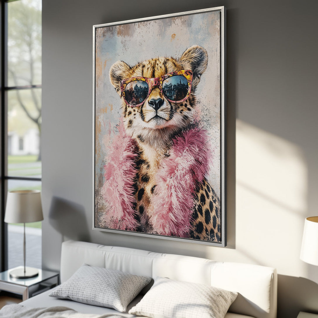 Framed Wall Art: Playful cheetah portrait with pink accents. Modern canvas print featuring a stylish animal in a vibrant, fun color palette. Perfect for home decor.