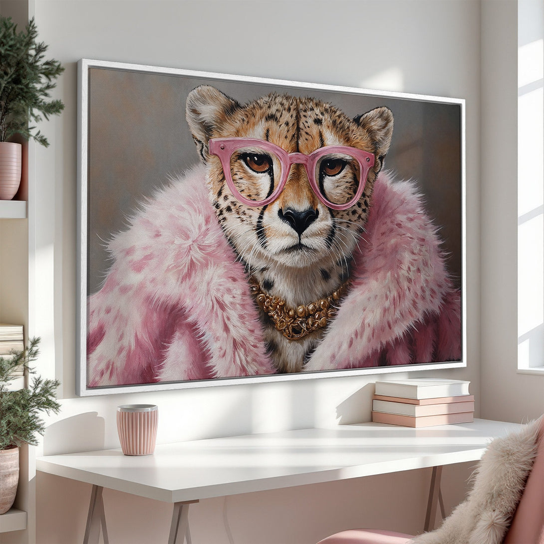 Framed Wall Art featuring a stylish cheetah in pink glasses and fur. Contemporary art with a playful, chic aesthetic, perfect for adding a pop of color.