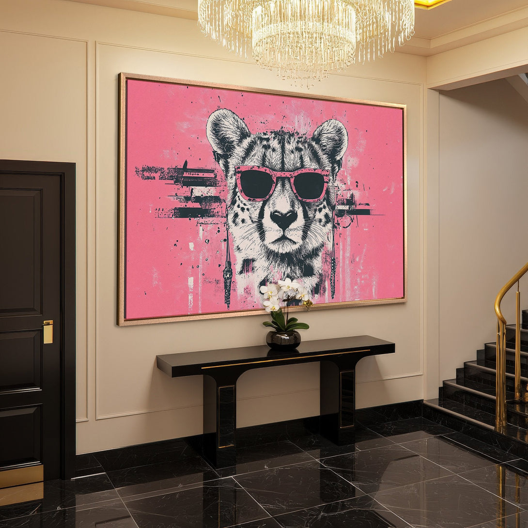 Framed Wall Art: Stylish cheetah portrait with pink sunglasses on a pink background. Modern art piece with a bold, eye-catching color palette.