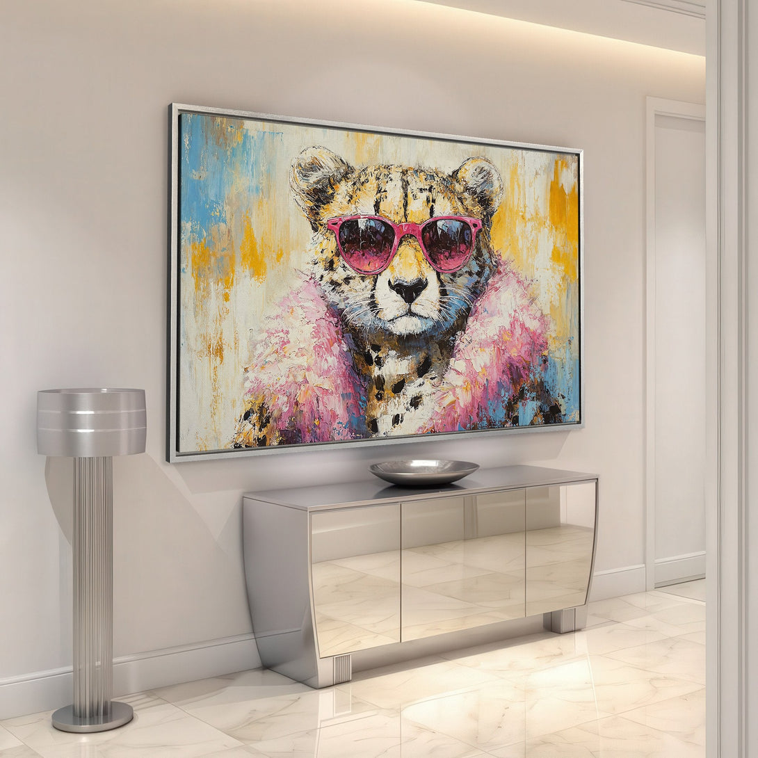 Framed Wall Art: Cool cheetah portrait in sunglasses. Modern, abstract style with pink, blue, and yellow color palette. Perfect for adding personality to any space.