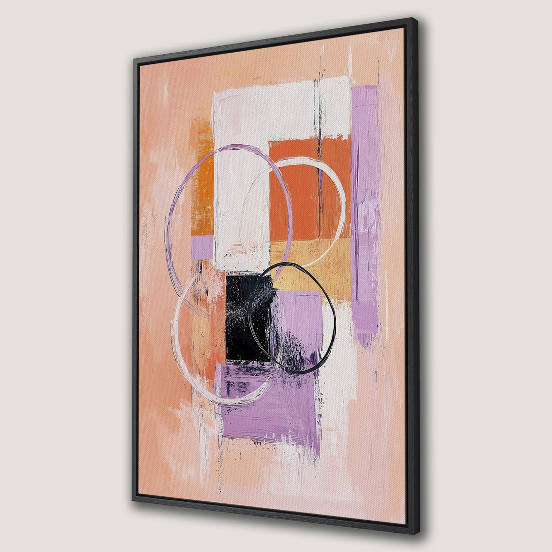 Framed Wall Art featuring an abstract painting with geometric shapes and circles. Warm peach, purple, and white color palette. Modern art for home decor.
