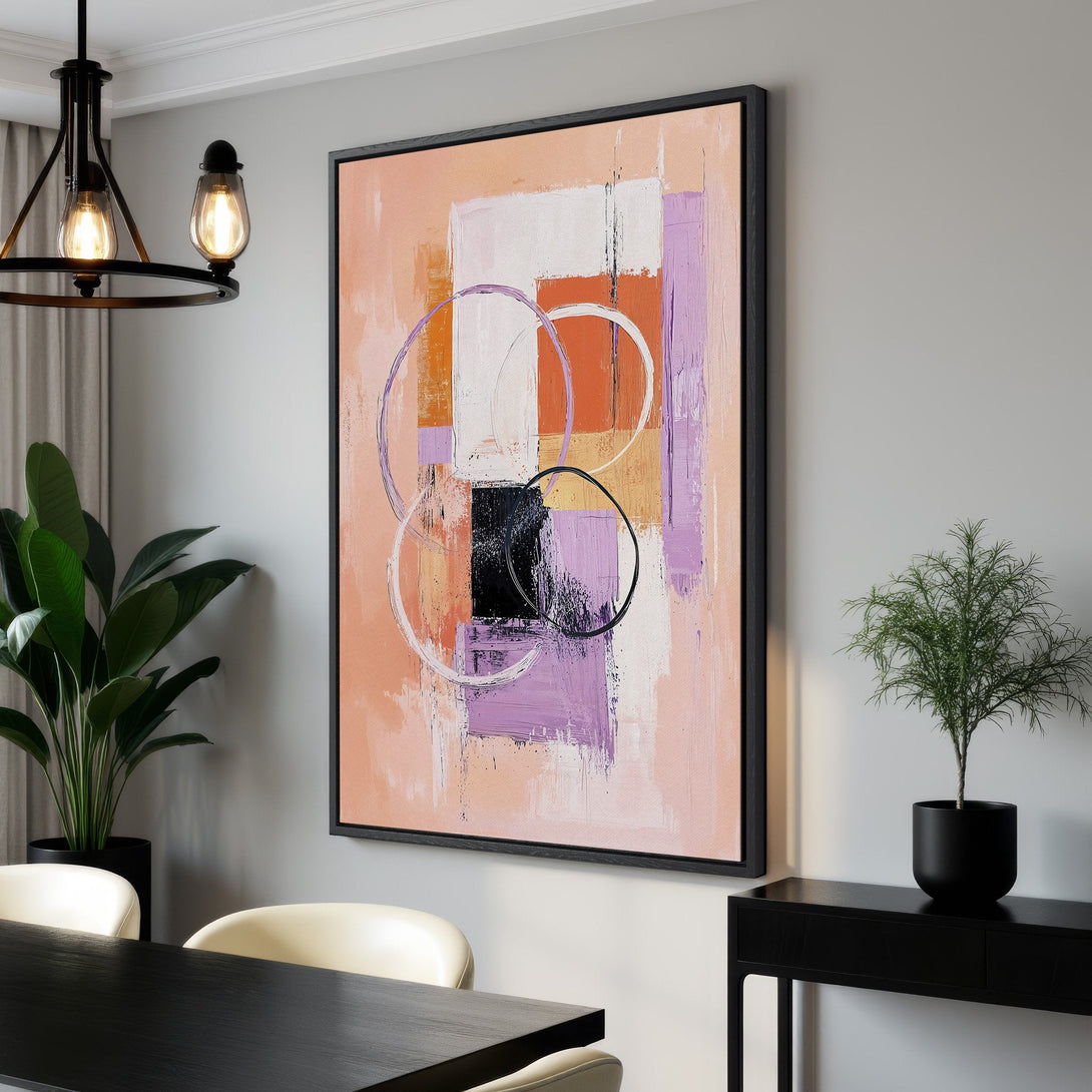 Framed Wall Art: Abstract art Canvas Print in a modern interior. Features a warm peach, purple, and orange color palette. Perfect for adding style to your home decor.