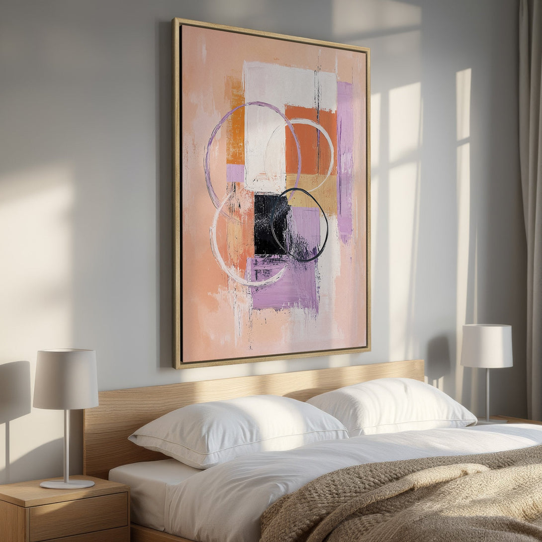 Abstract Canvas Print in a bedroom setting. Features a modern geometric design with peach, purple, and orange hues. Perfect for adding a pop of color!