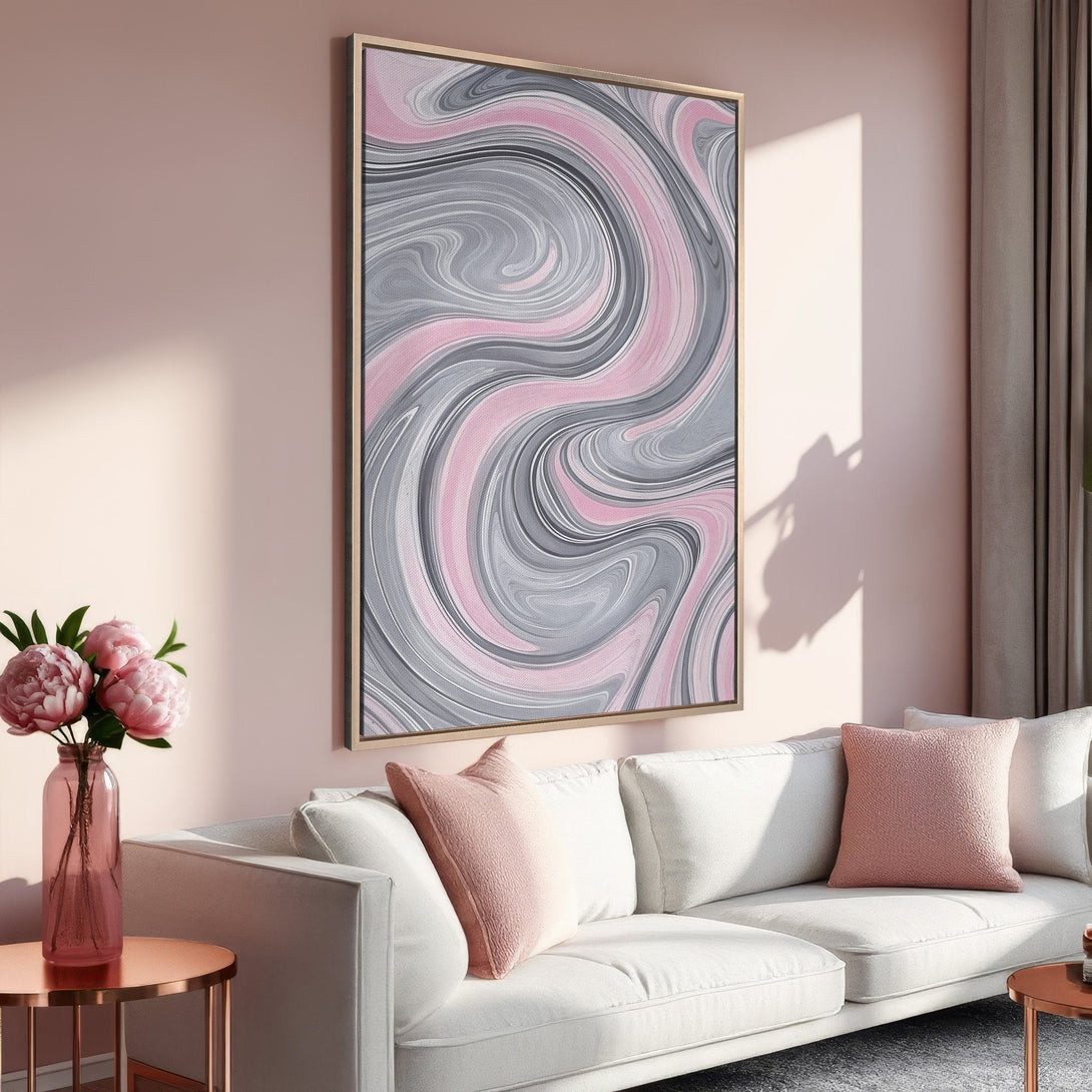 Framed Wall Art featuring a modern abstract design in pink and gray. Elevate your space with this stylish canvas print, perfect for adding a touch of elegance.