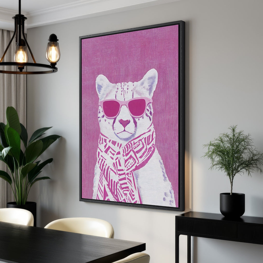 Framed Wall Art featuring a stylish cheetah in pink sunglasses and scarf, pop art style. Vibrant pink and white color palette, perfect for modern decor.