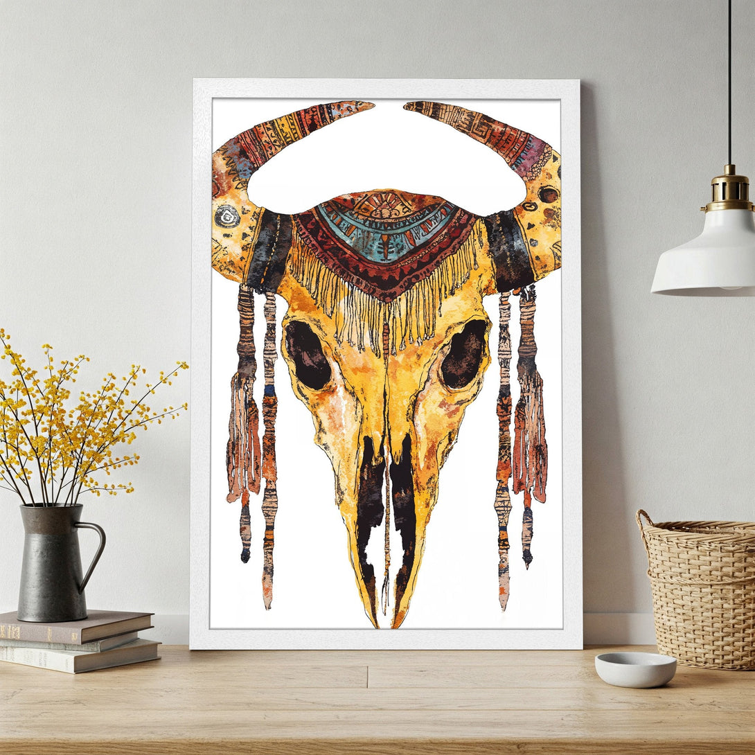 Framed Poster featuring a watercolor-style bull skull with an ethnic design, warm yellow and orange tones. Perfect wall art for boho decor.
