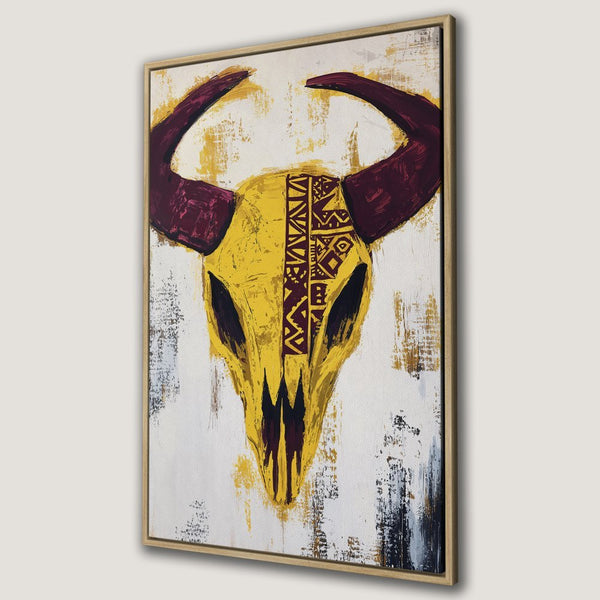 Framed Wall Art: Abstract bull skull painting in yellow, burgundy, and white. Add a touch of boho style to your home with this canvas print!