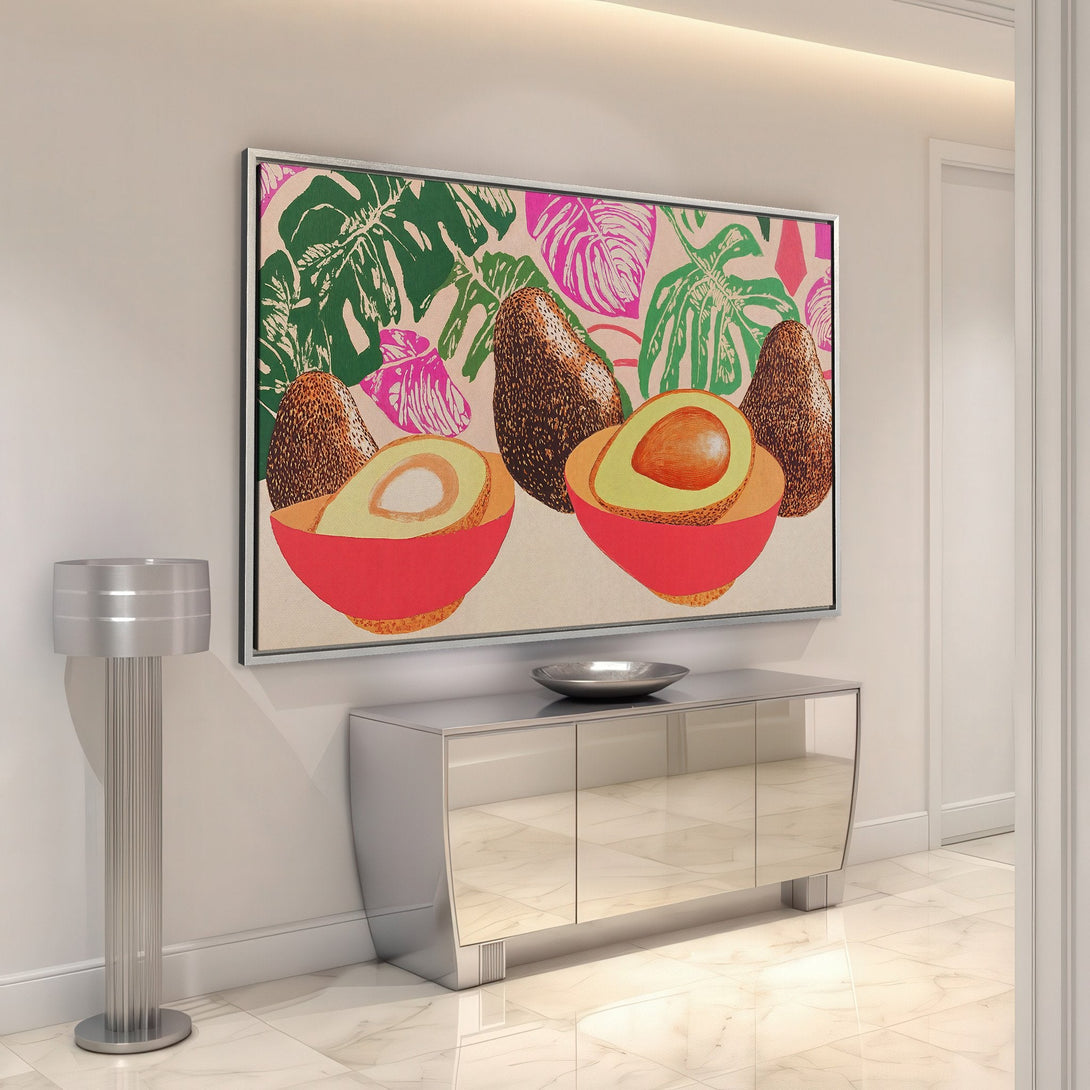 Framed Wall Art featuring a vibrant avocado print in a modern style. Bold pink, green, and brown colors add a pop of art to any interior.