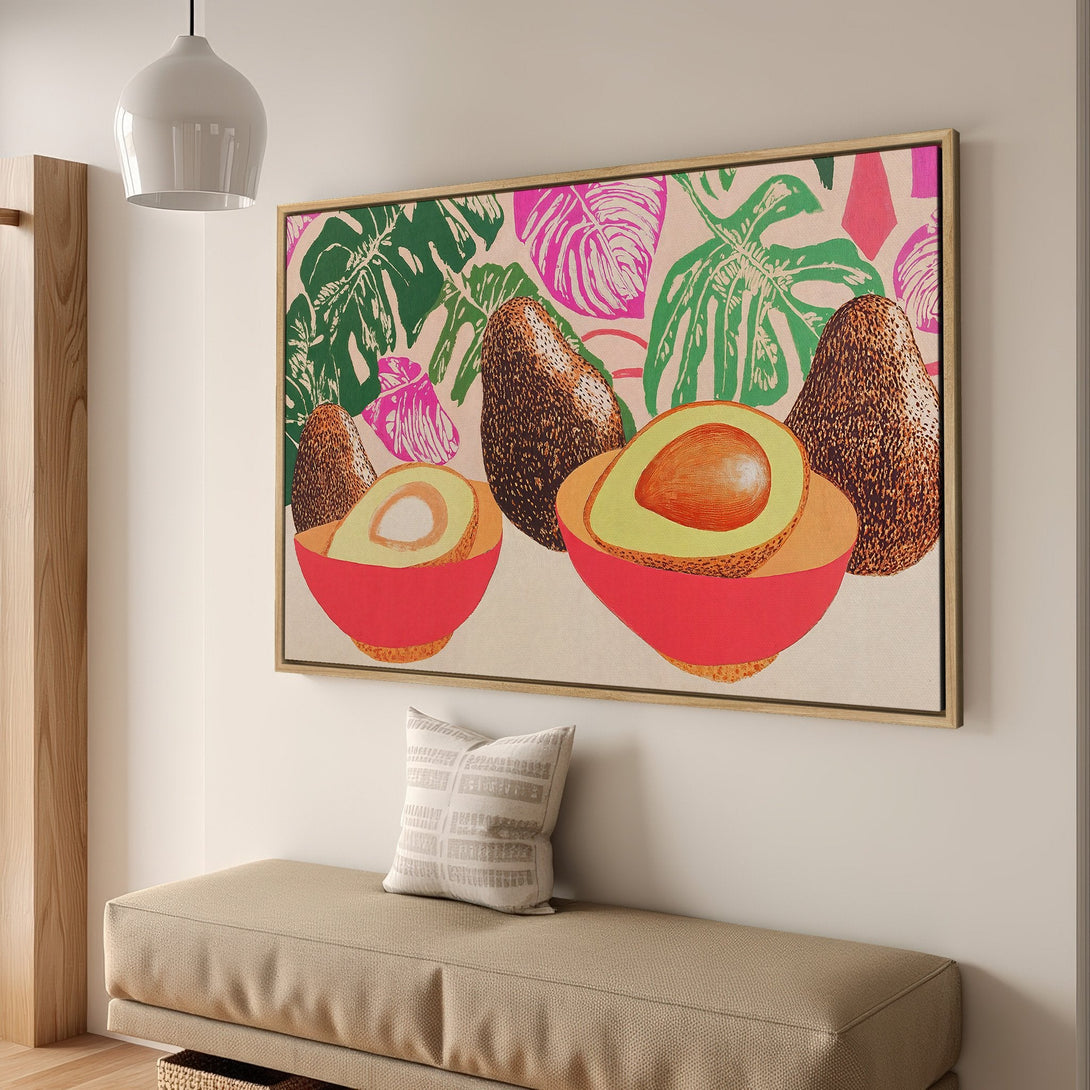 Framed Wall Art featuring avocados and tropical leaves. Modern pop art style with pink, green, and orange hues. Perfect kitchen or dining room decor.