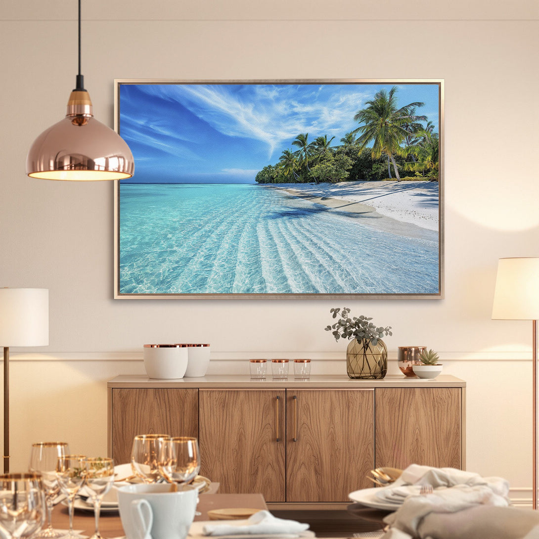 Framed Wall Art of a tropical beach scene with turquoise water and palm trees. Coastal decor in blue, green, and white. Perfect for a serene living space.