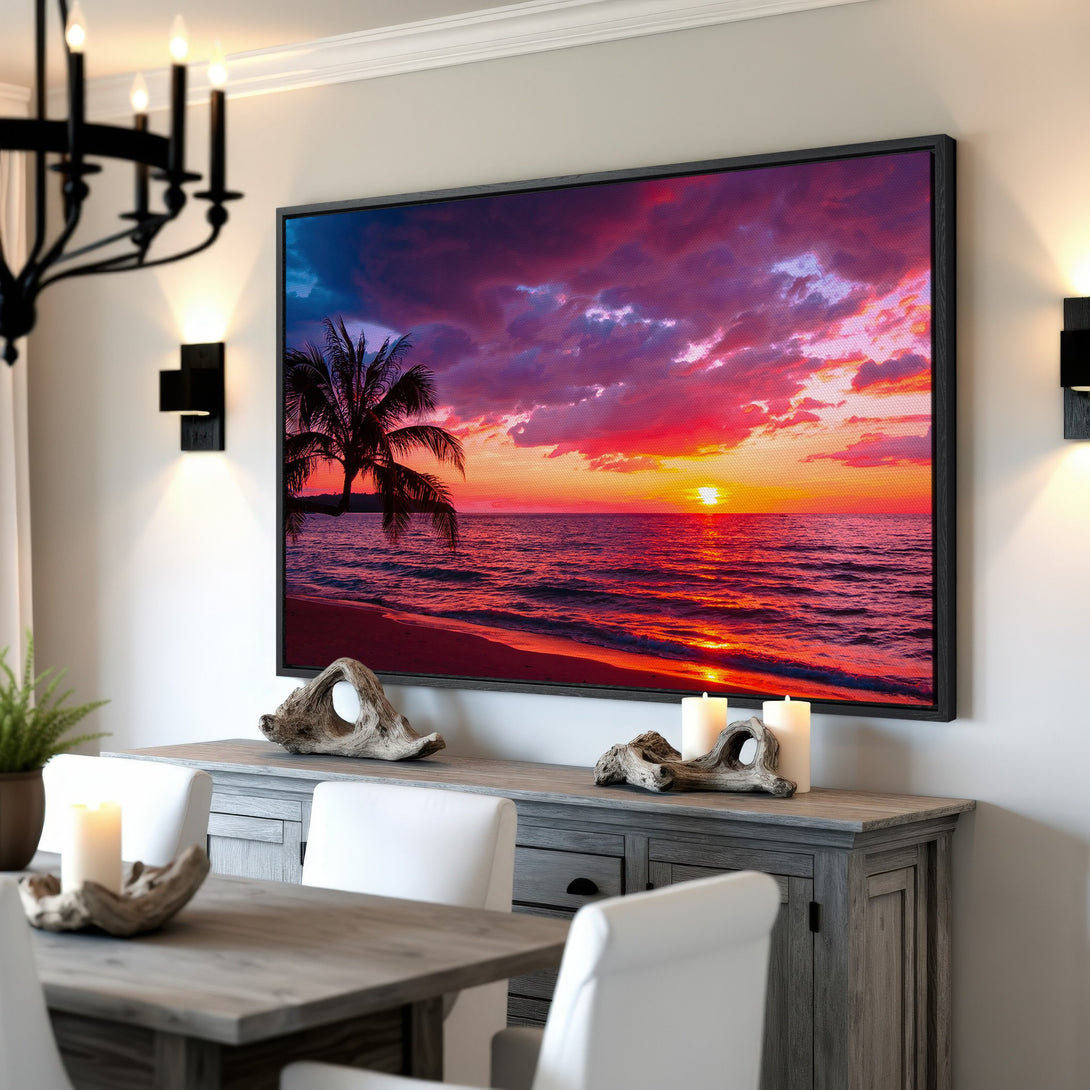 Framed Wall Art: Stunning sunset beach scene in vibrant red and purple hues. Coastal decor for your home. Canvas Print adds a touch of paradise.