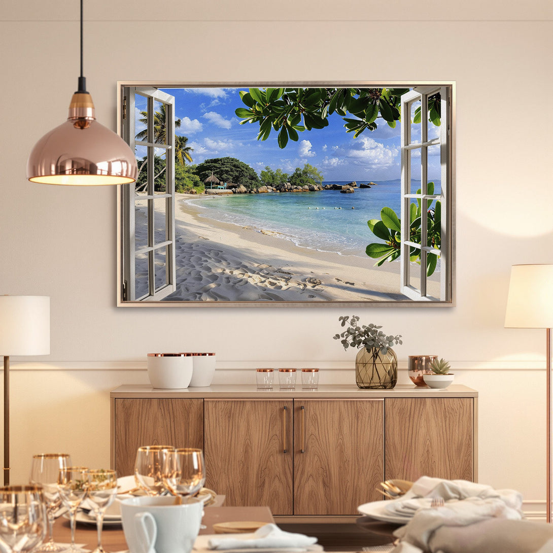 Framed Wall Art: Beach scene canvas print with blue ocean, white sand, and lush green foliage, perfect for coastal decor.