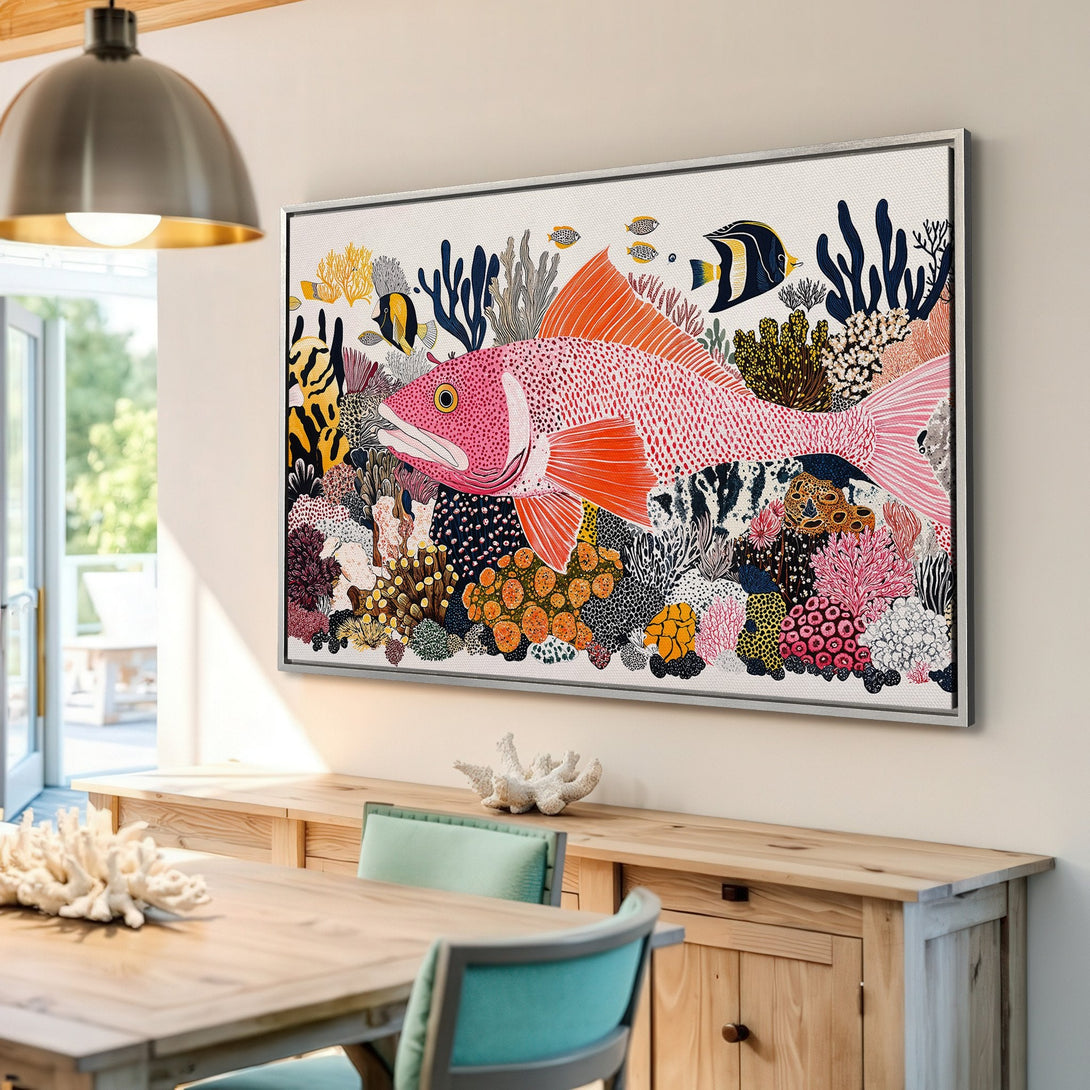 Framed Wall Art featuring a vibrant coral reef scene with a large pink fish. Colorful illustration style with a palette of pinks, oranges, and blues.