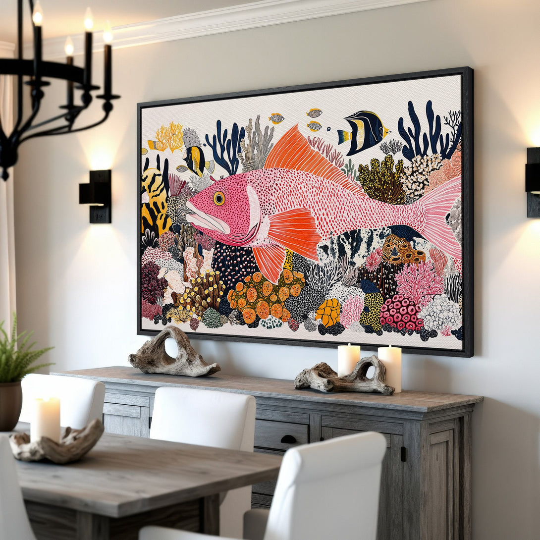 Framed Wall Art featuring a vibrant coral reef scene with a large pink fish. Colorful illustration style with a pink, orange, and blue palette. Perfect for coastal decor!
