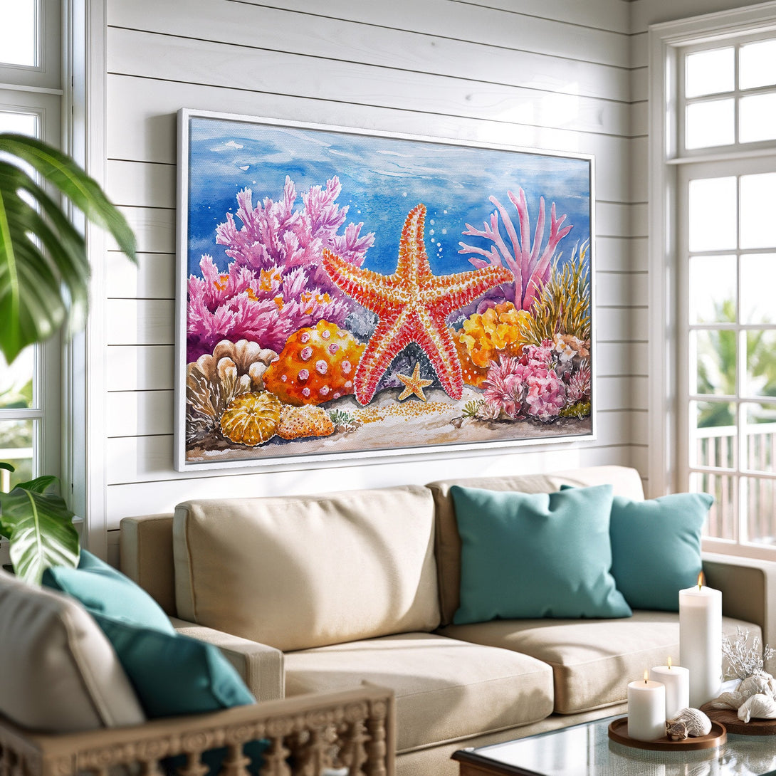 Framed Wall Art featuring a watercolor starfish and coral reef scene in vibrant pinks, oranges, and blues. Coastal decor for a relaxing living room.