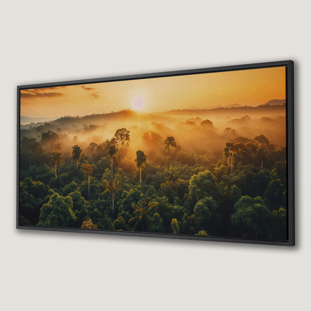 Framed Wall Art: Serene sunrise over a lush rainforest. Warm orange and green tones create a tranquil, natural landscape. Perfect for nature lovers.