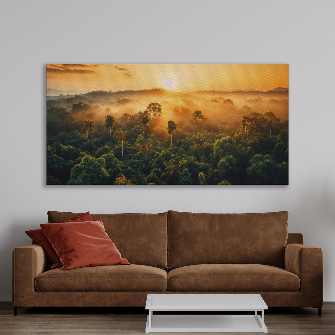 Framed Wall Art of a lush green forest at sunrise. Warm, inviting color palette with gold frame. Perfect for living room decor.