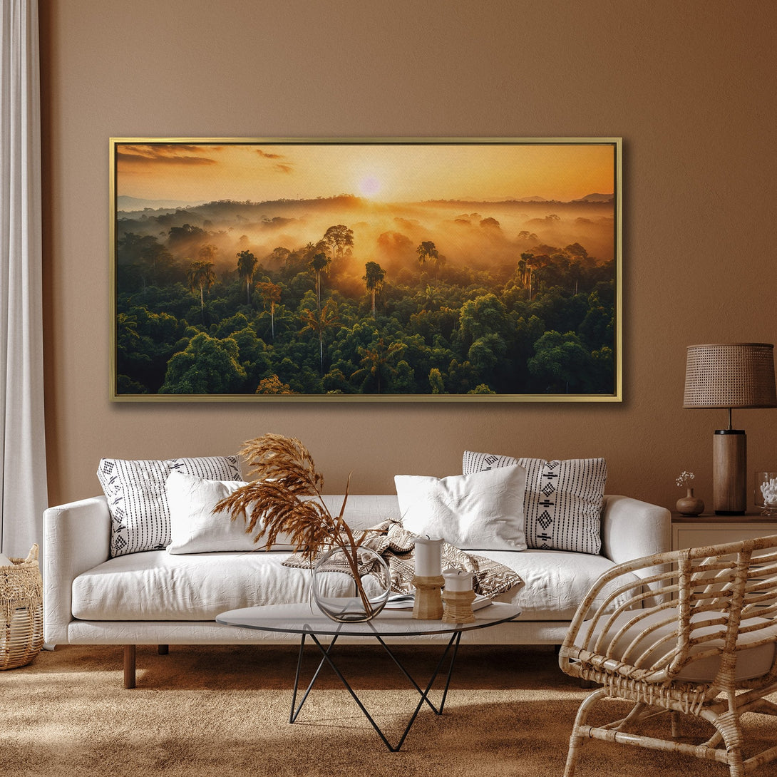 Canvas Print of a vibrant sunrise over a lush rainforest. Warm orange and green color palette. Perfect for adding a touch of nature to your home.