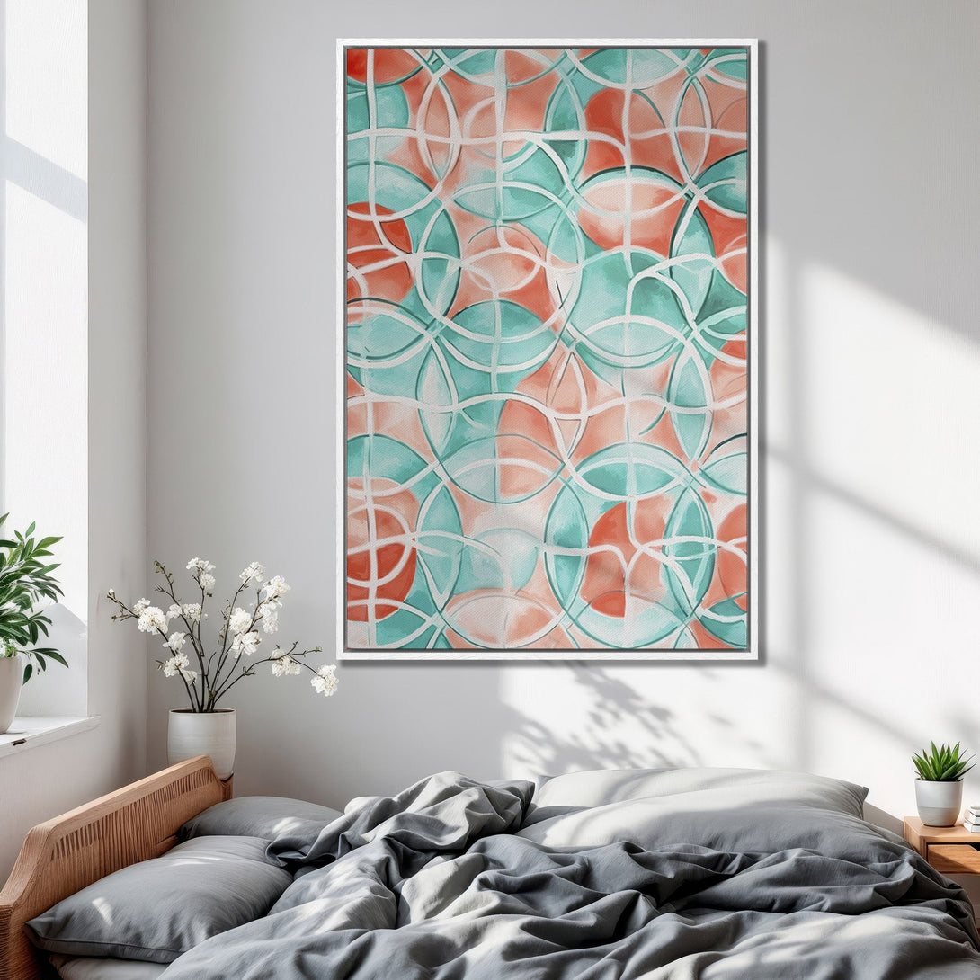 Framed Wall Art featuring an abstract geometric design in coral and teal. Modern art print adds a pop of color to your bedroom decor.