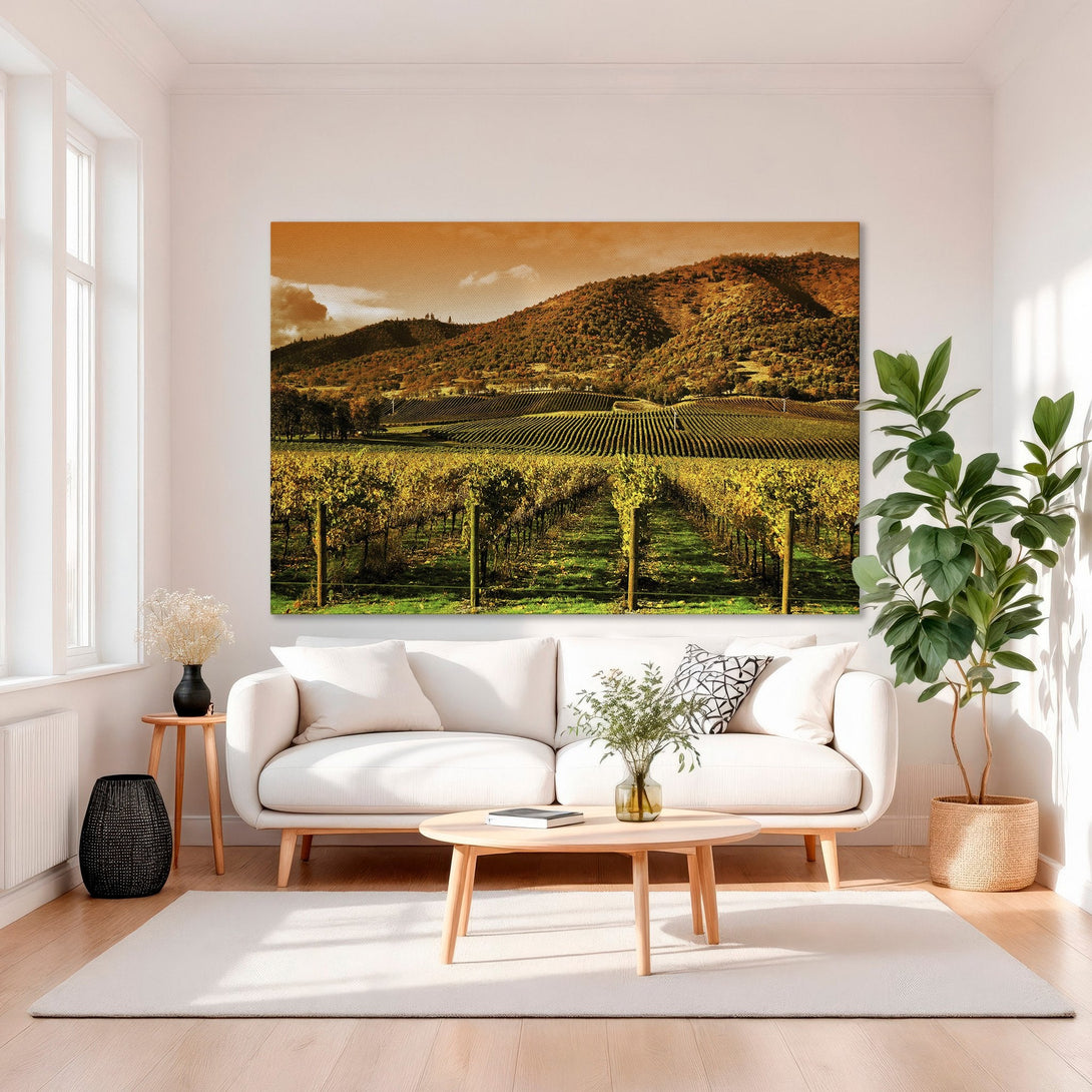 Framed Wall Art of a vineyard landscape with warm orange and gold tones, perfect for adding a touch of elegance to your home.