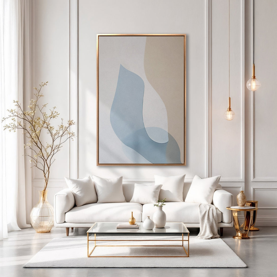 Framed Wall Art: Abstract art in soft blue and beige tones, displayed in a modern living room. Elevate your space with this stylish canvas print!
