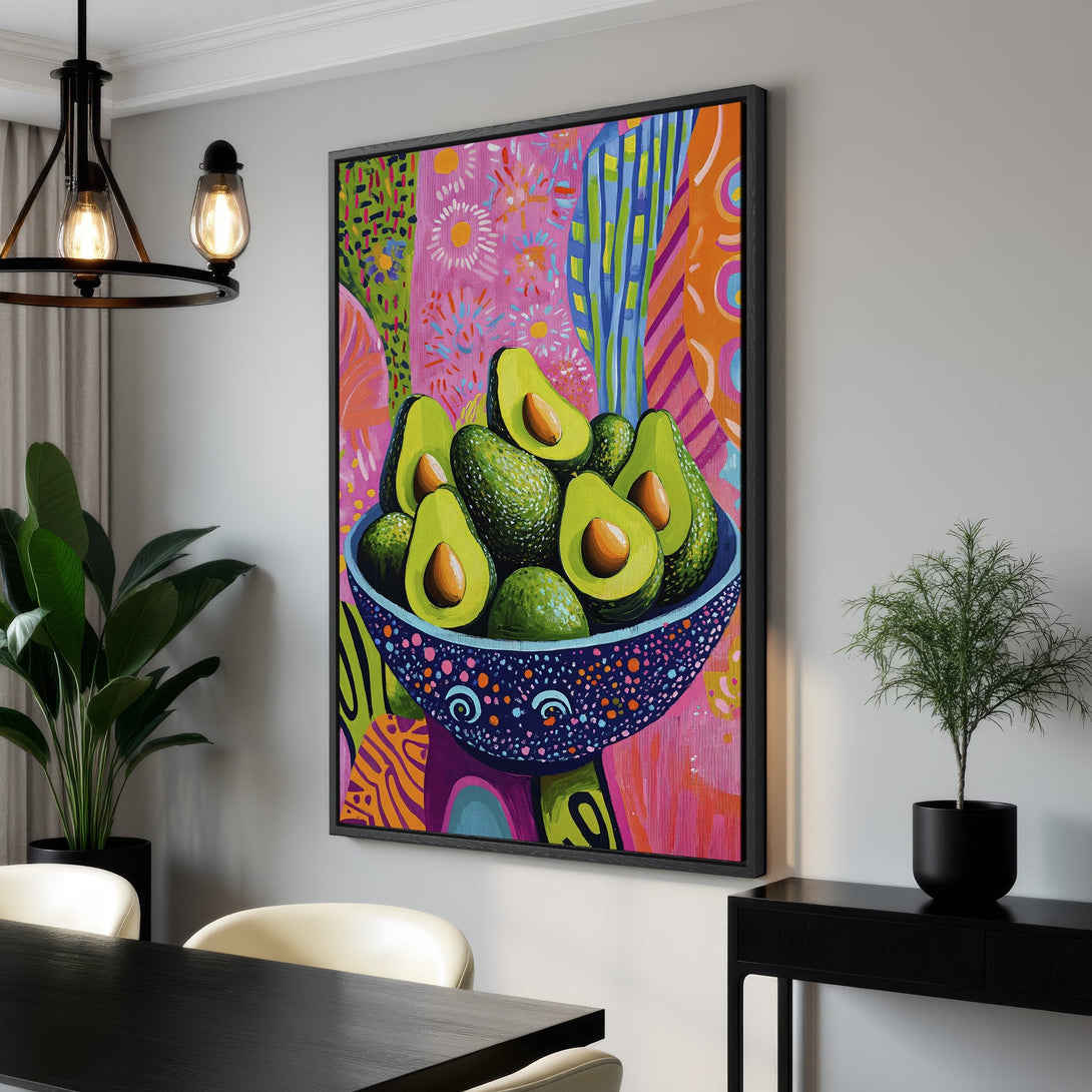 Framed Wall Art featuring vibrant avocado painting. Modern, colorful abstract style with pink, green, and orange hues. Perfect kitchen or dining room decor.