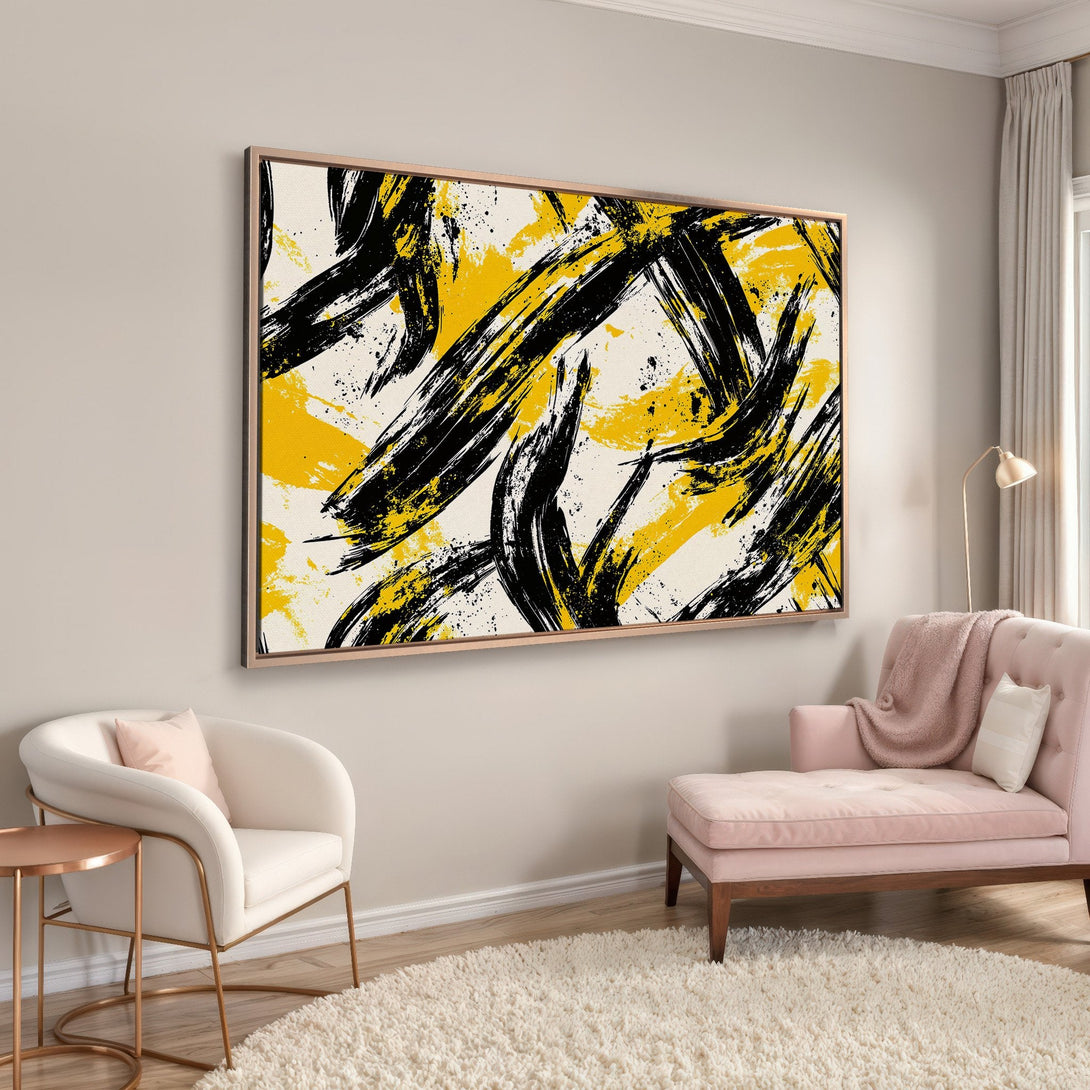 Framed Wall Art: Abstract brushstroke art in black, yellow, and cream. Modern canvas print adds a pop of color to any interior design.