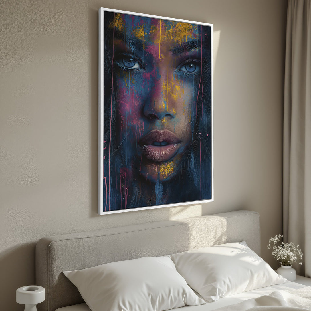 Framed Wall Art: Abstract portrait canvas print with vibrant blue, pink, and yellow hues. Modern art for bedroom decor.