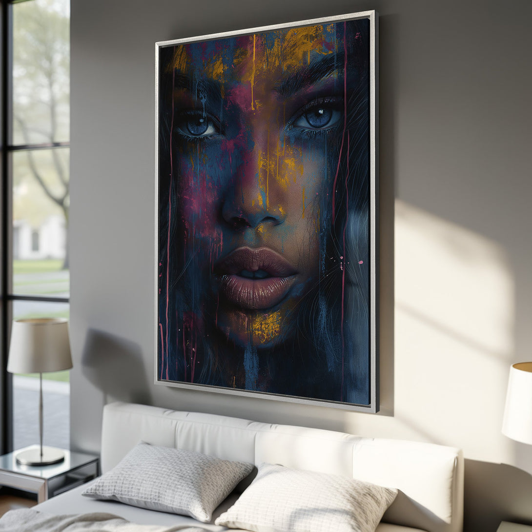 Framed Wall Art featuring a woman's face in abstract style. Bold blue, pink, and gold color palette. Modern art for your home decor.