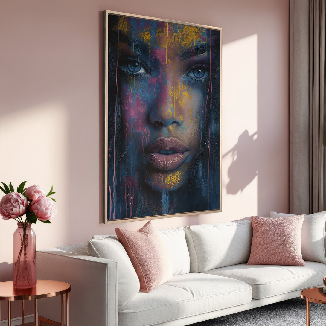 Framed Wall Art featuring a vibrant, abstract portrait of a woman with blue eyes, in a colorful palette of blues, pinks, and yellows. Perfect home decor.