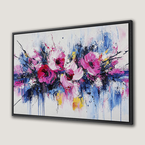Framed Wall Art: Abstract floral canvas print with vibrant pink, blue, and yellow hues. Modern art for your home decor.