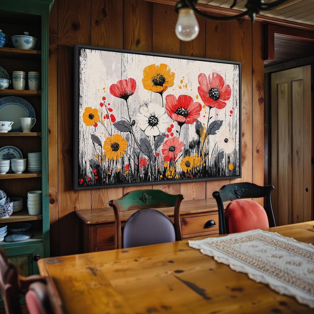 Framed Wall Art: Floral canvas print in a rustic dining room. Features red, yellow, and white flowers against a neutral background. Perfect for adding color!