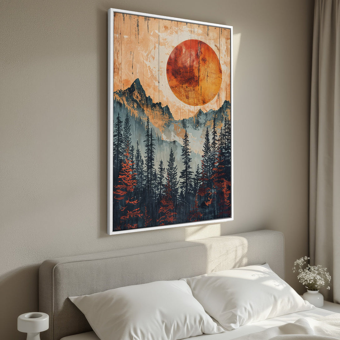 Framed Wall Art featuring a sunset over a mountain forest. Rustic style with warm orange, teal, and black color palette. Perfect bedroom decor.