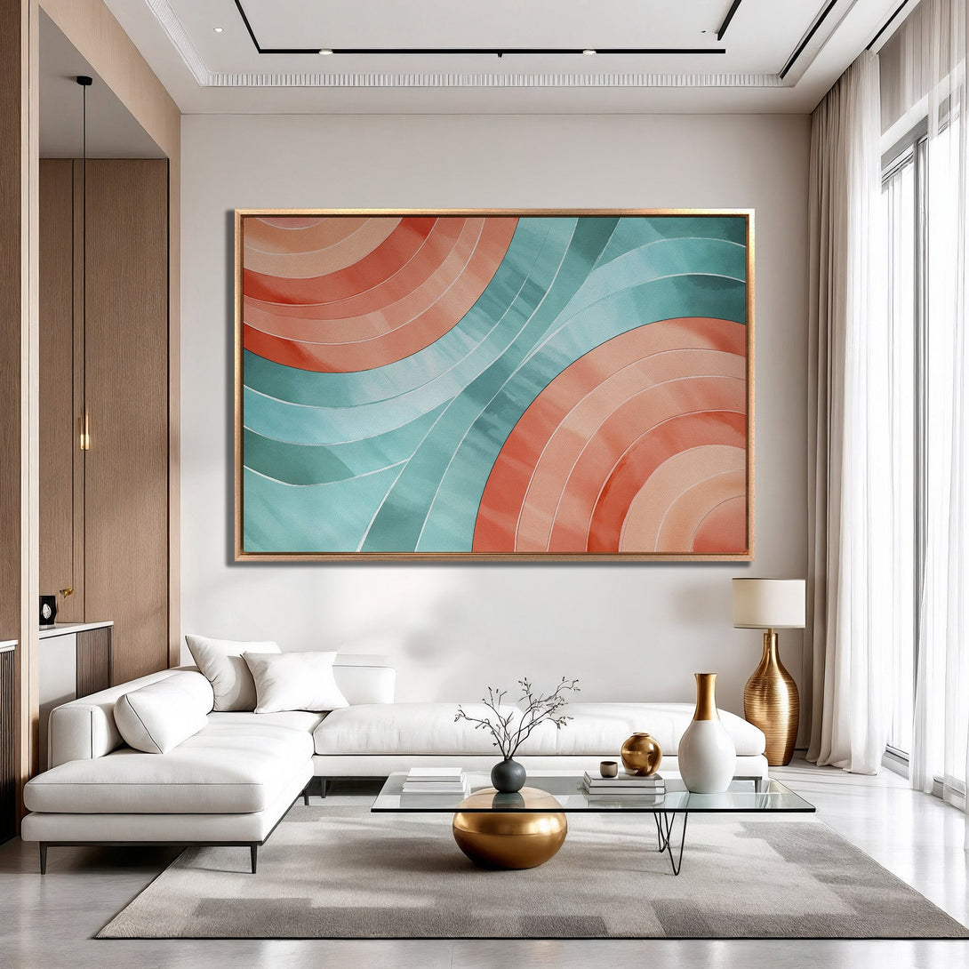 Framed Wall Art featuring an abstract watercolor design in teal and coral. Modern art for a stylish living room.