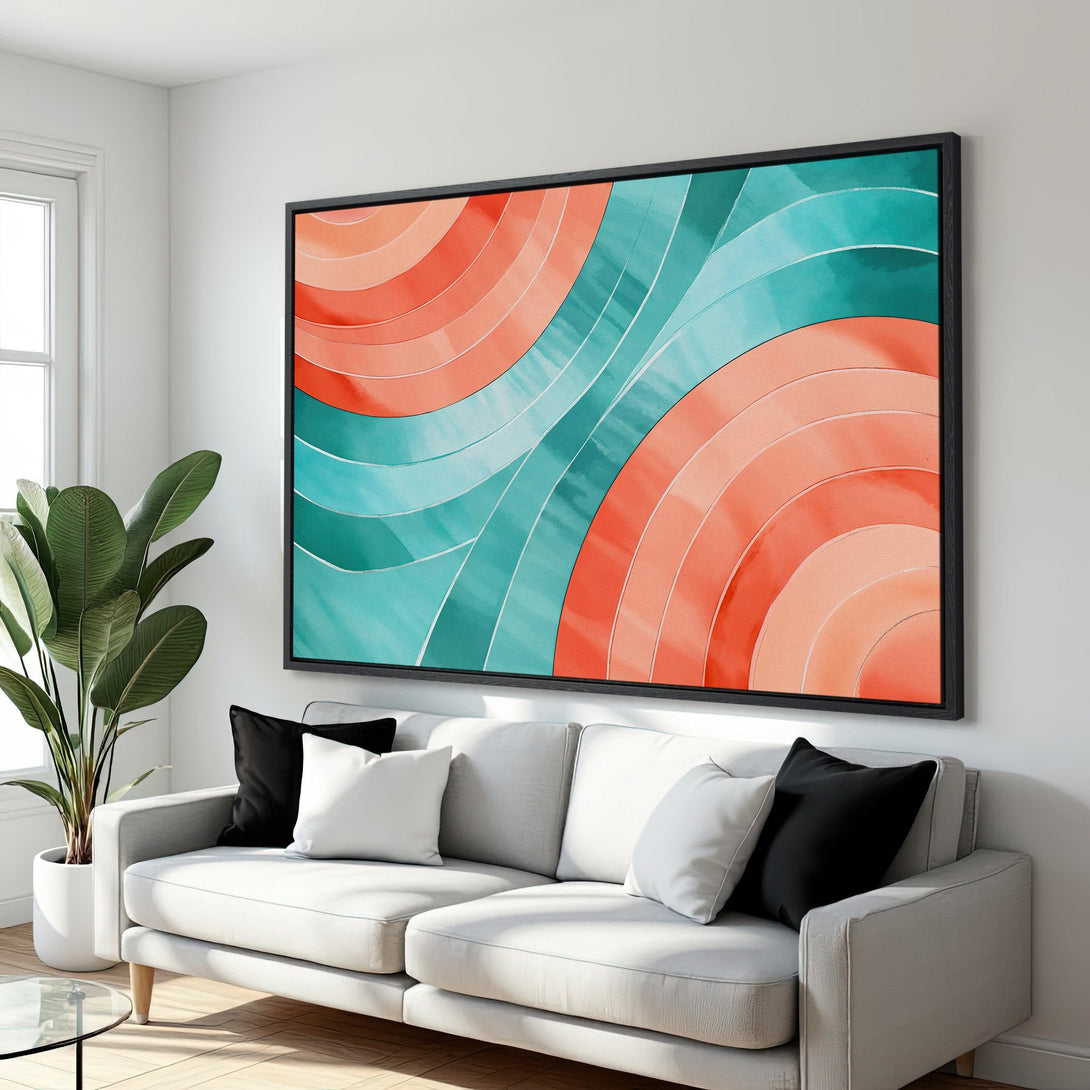 Framed Wall Art featuring an abstract watercolor design in coral and teal. Modern Canvas Print adds a pop of color to any living space.