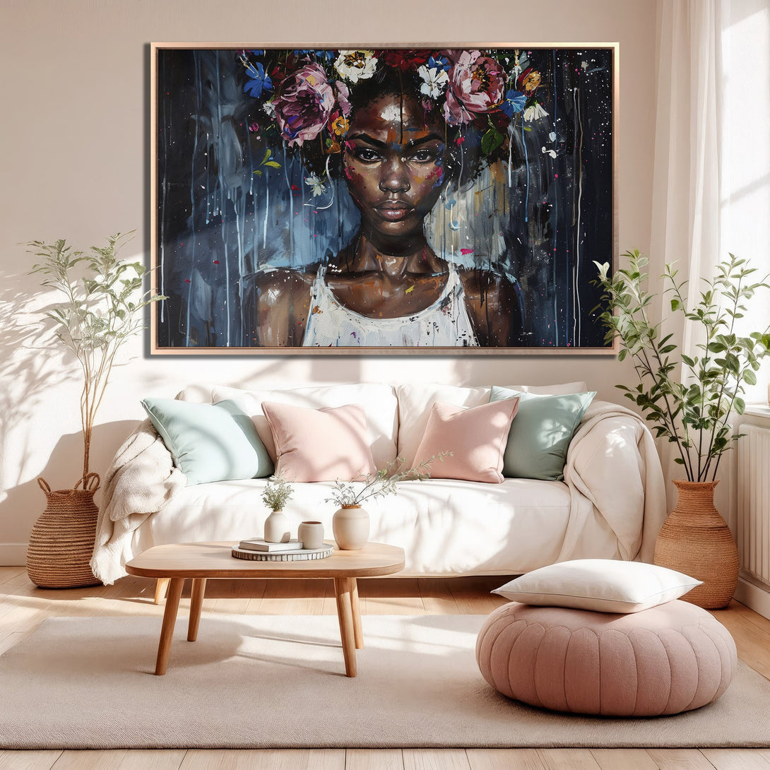 Framed Wall Art featuring a striking portrait of a woman with a floral crown. Modern, expressive style with a moody blue and pink color palette. Perfect for home decor.
