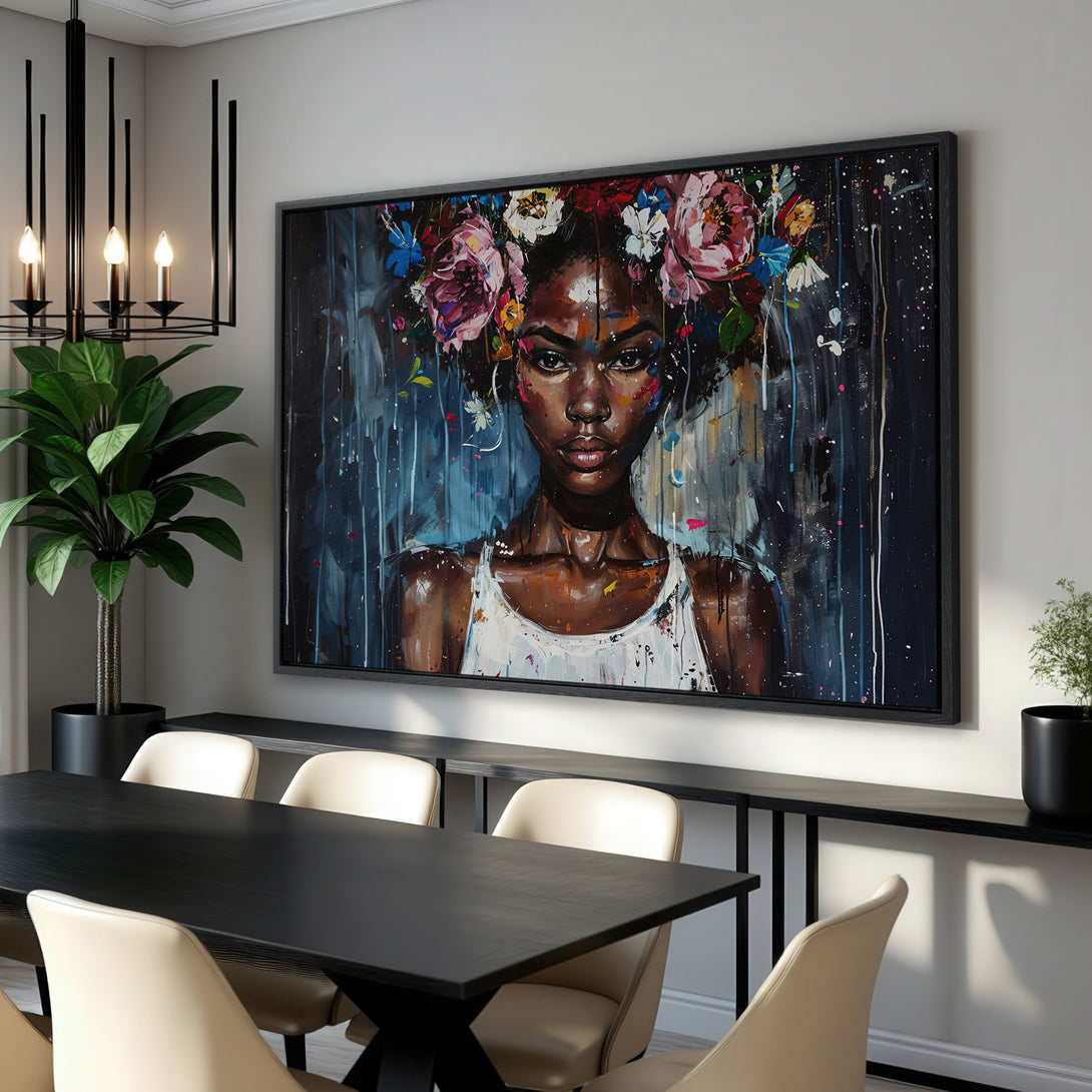 Framed Wall Art featuring a vibrant portrait of a woman with floral headpiece. Modern, abstract style with a dark, moody blue and colorful palette. Perfect for any room!