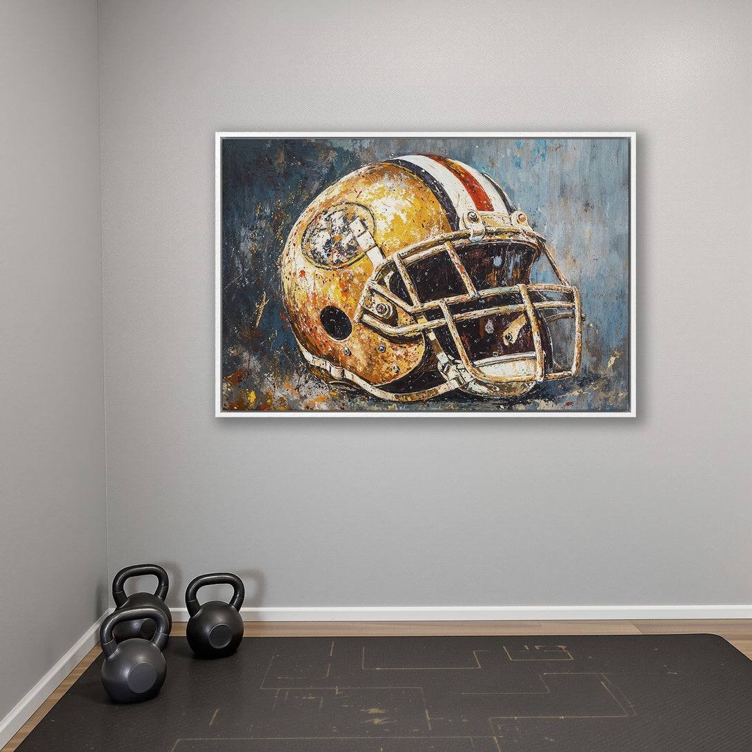 Framed Wall Art: Abstract football helmet painting in gold, blue, and red. Perfect for a sports-themed home gym. Add art to your space today!